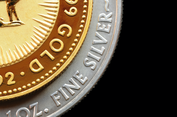 Gold and Silver Coin Isolated on Black