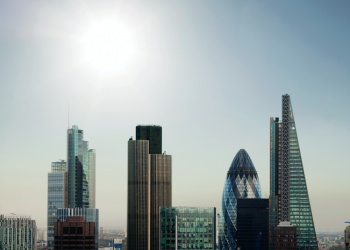 The City of London financial district with sun