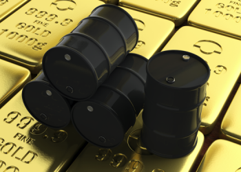 Oil barrels on gold bullions background. 3d illustration