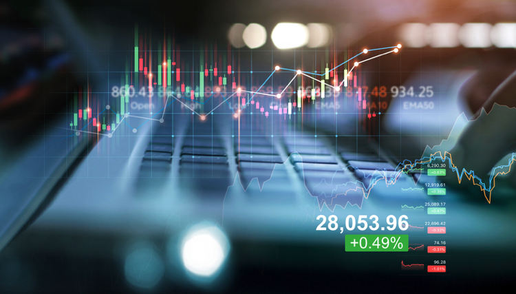 Double exposure of forex graph growth. Stock market. Businessman using laptop of financial data analysis on blue background.