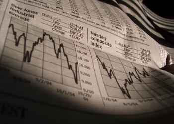 Business News Stock Charts from Newspaper