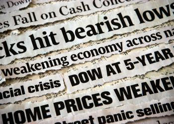 Economic headlines surrounding each other
