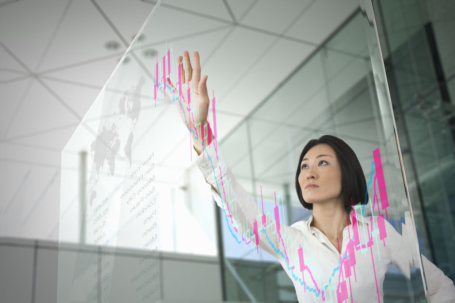 Businesswoman checking the stock chart