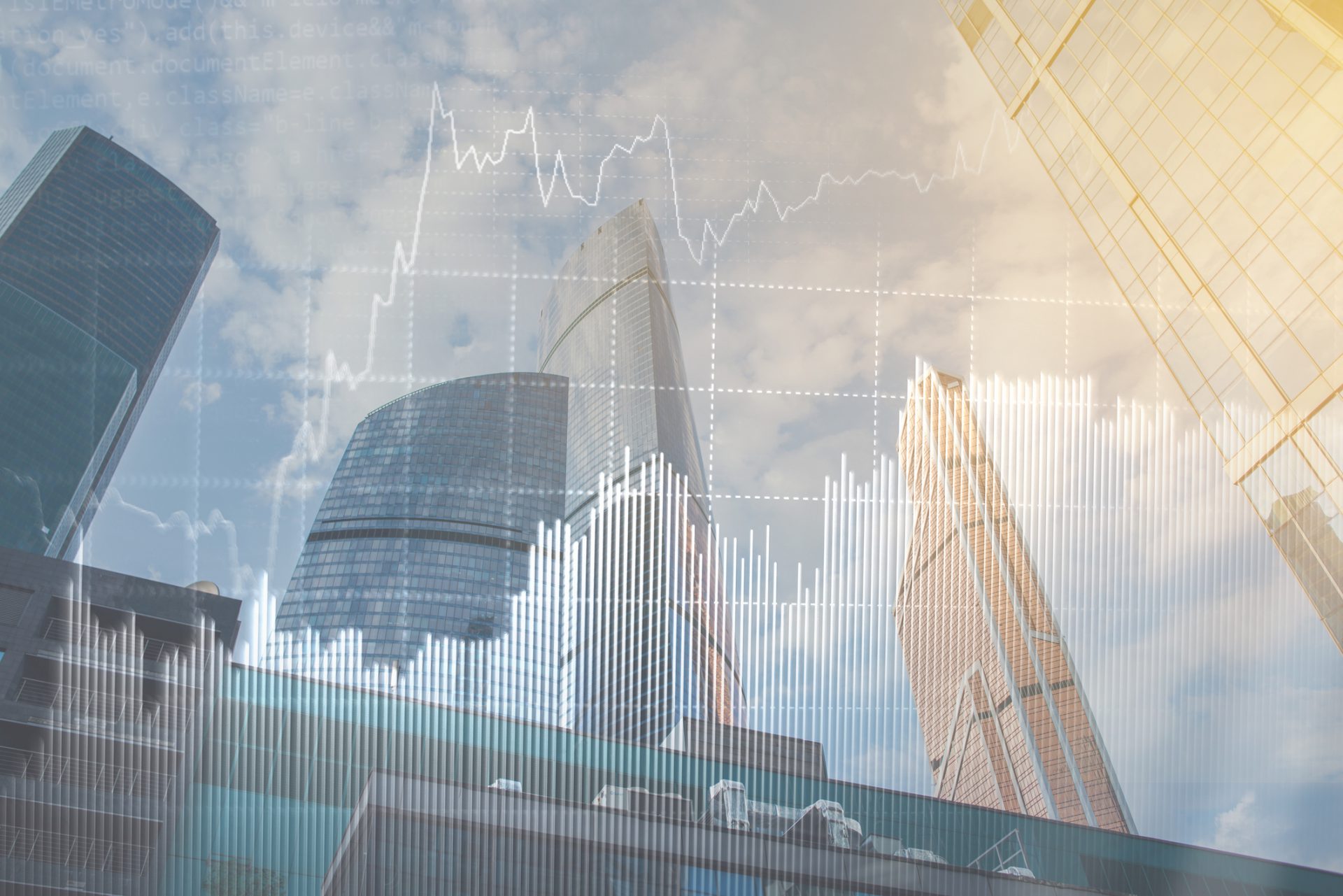Double explosure with business charts and financial district.