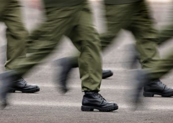 WINCHESTER, ENGLAND - MARCH 9: Army recruits go through basic training at the Army Training Regiment on March 9, 2005 in Winchester, England. The House of Commons Defence Select Committee and the Adult Learning Inspectorate are due to release the results of their investigations into military training conditions in March 2005.