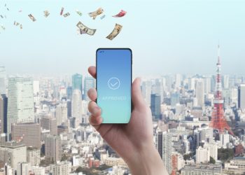 Mobile payment. Woman's hand has smartphone with banknote in the sky.