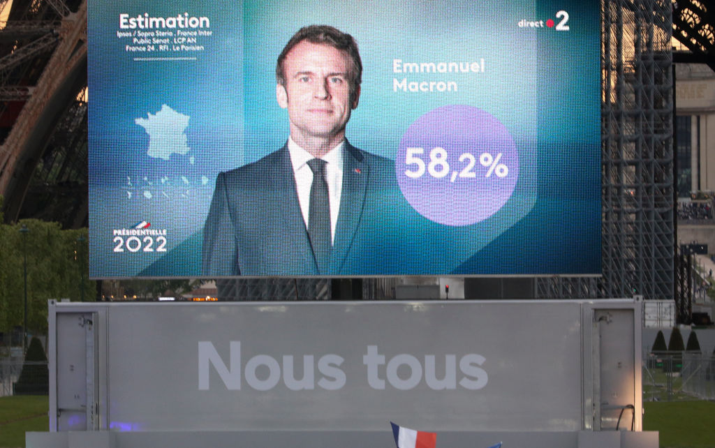 PARIS, FRANCE - APRIL 24: Emmanuel Macron's victory celebration at the Champ de Mars near the Eiffel Tower on April 24, 2022 in Paris, France. France's centrist incumbent President Emmanuel Macron beats his far-right rival Marine Le Pen in the presidential second round for a second five-year term as President. (Photo by Jean Catuffe/Getty Images)