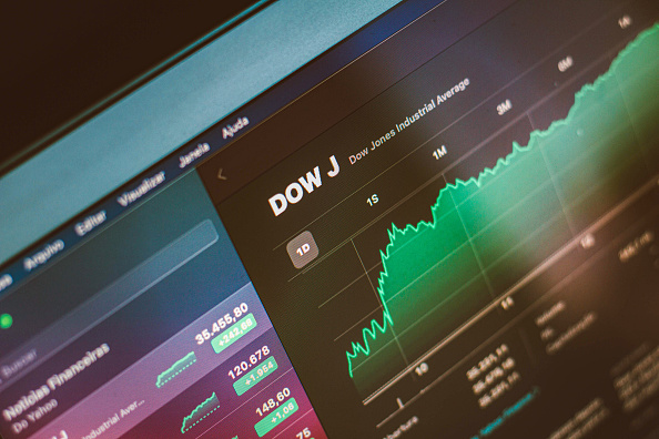 In this photo illustration the Dow Jones Industrial Average