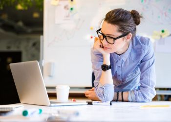 Young female businesswoman in the office