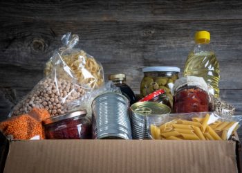 Volunteer with box of food for poor . Ramazan kolisi . Donation concept