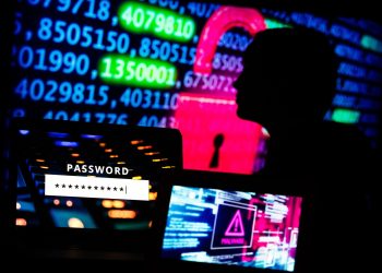 Computer code displayed on screens arranged in Danbury, U.K., on Monday, Jan. 4, 2021. In the spring, hackers managed to insert malicious code into a software product from an IT provider called SolarWinds Corp., whose client list includes 300,000 institutions. Photographer: Chris Ratcliffe/Bloomberg