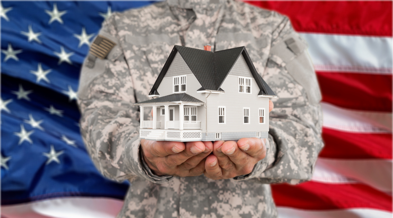 Military man Holding House Model, Real Estate Concept